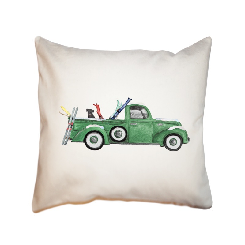 green truck with skis and lab square pillow
